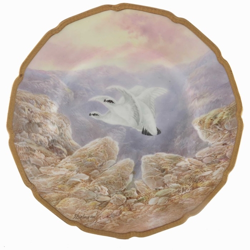 738 - J Birbeck Senior for Royal Doulton, a pair of painted cabinet plates, each with Ptarmigans in mounta... 