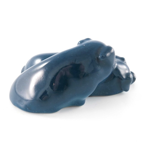 741 - Charles Noke for Royal Doulton, Snoozing Pigs figure group in blue glaze, small version, 9.5cm long