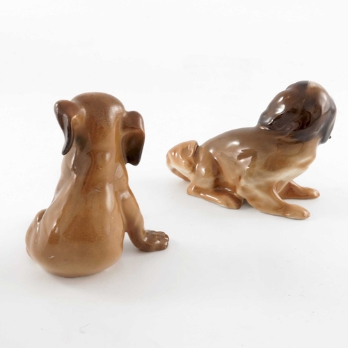 750 - Charles Noke for Royal Doulton, two dog figures, Cavalier King Charles Spaniel HN127 and Puppy HN128... 