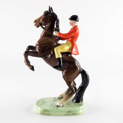 760 - A Beswick figure Huntsman on Rearing Horse, first version, with orange jacket and yellow trousers, 2... 