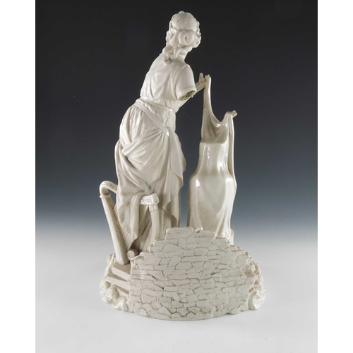 763 - A Belleek first period bisque advertising figure, Erin, modelled as a Classical woman unveiling a va... 