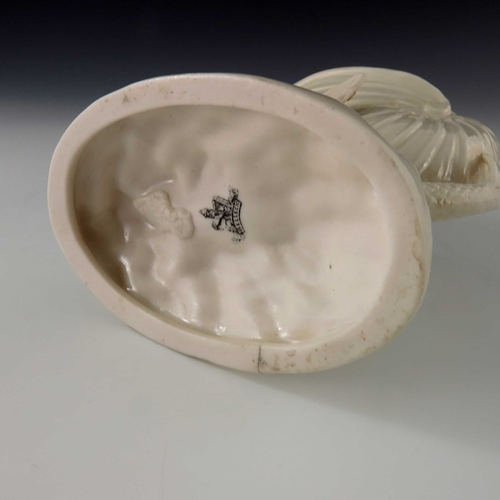 765 - A Belleek first period Flying Fish vase, pearlescent glaze, modelled as a winged fish with conch she... 