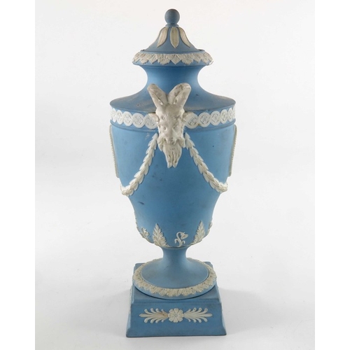 775 - Two Wedgwood Jasperware urn vases and covers, late 19th century, twin handled, one white on blue, og... 