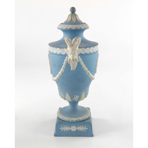 775 - Two Wedgwood Jasperware urn vases and covers, late 19th century, twin handled, one white on blue, og... 