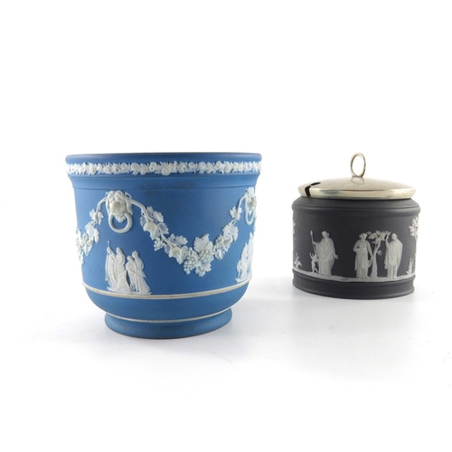 777 - Two Wedgwood Jasperware pots, circa 1850, one of jardiniere form, white over blue, applied with scen... 