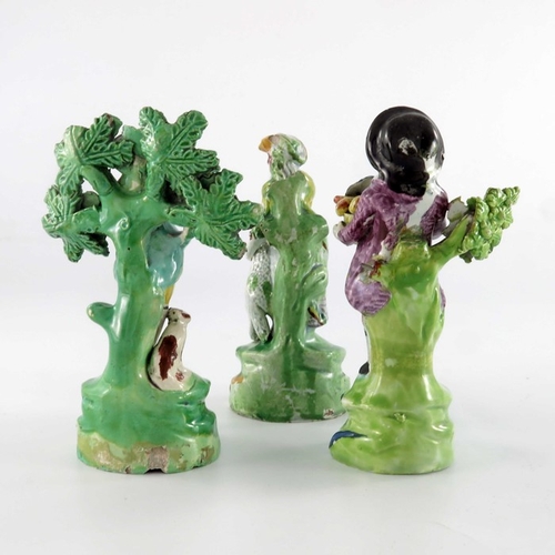 785 - Three pearlware figures, circa 1800, including 'Frute Boy', Shepherd and Shepherdess, modelled stand... 