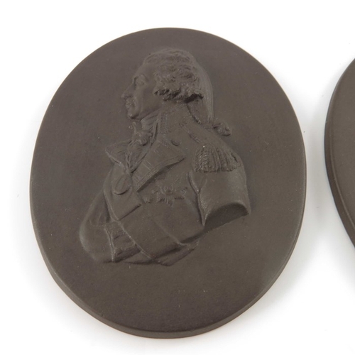 793 - Two Wedgwood style portrait plaques, Nelson and Josiah Wedgwood, modelled in relief in brown basalt,... 