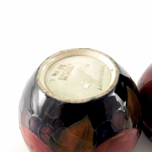 637 - William Moorcroft, two small Pomegranate vases, circa 1918, ovoid and inverse baluster form, impress... 