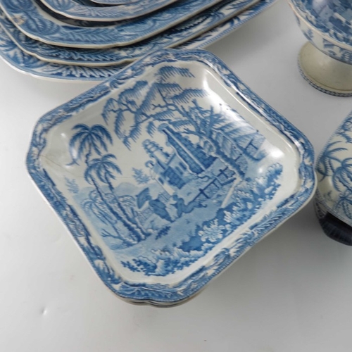 780 - A Davenport blue and white part dinner service, Chinoiserie Ruins, circa 1820, including dessert dis... 