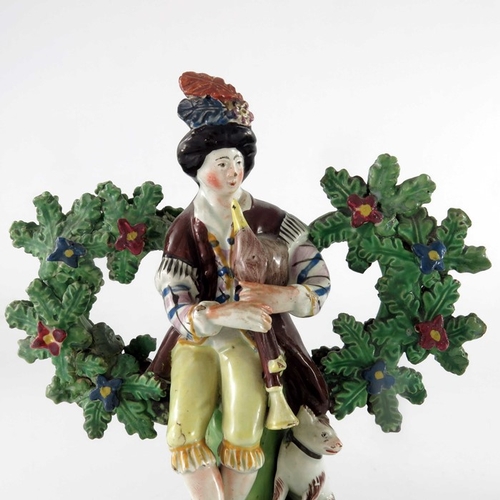 782 - A pair of Staffordshire pearlware figures, circa 1800, modelled as shepherd and shepherdess with mus... 