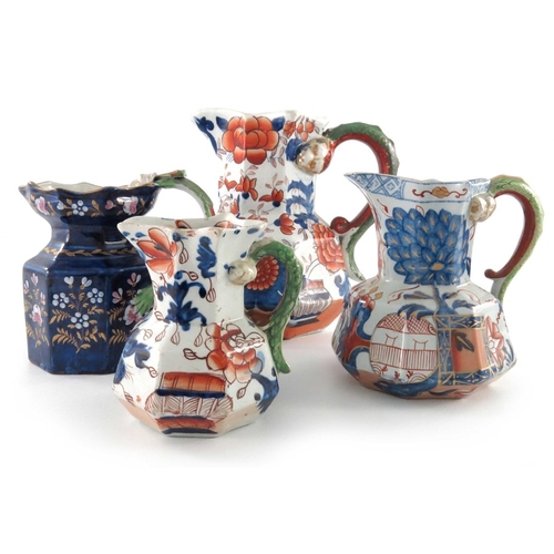 797 - Four ironstone dragon handled jugs, Masons and Davenport, various sizes, Imari and cobalt blue decor... 