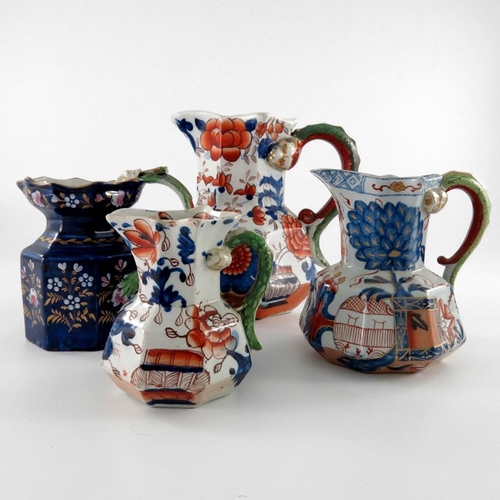 797 - Four ironstone dragon handled jugs, Masons and Davenport, various sizes, Imari and cobalt blue decor... 