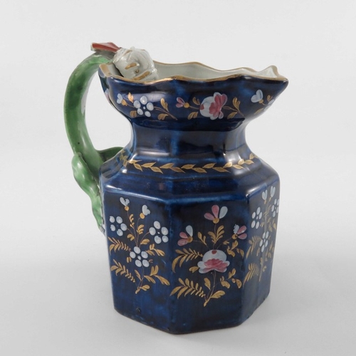 797 - Four ironstone dragon handled jugs, Masons and Davenport, various sizes, Imari and cobalt blue decor... 