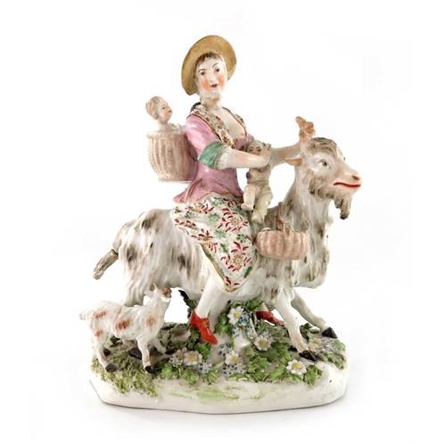 798 - A Derby porcelain figure, the Welch Tailor's Wife, circa 1770, modelled as a woman with children rid... 