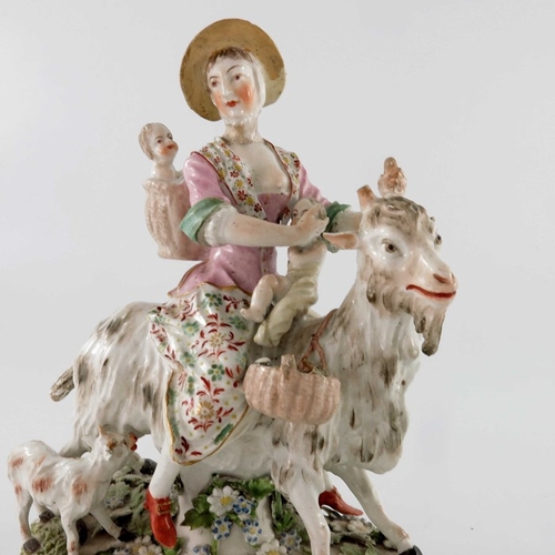 798 - A Derby porcelain figure, the Welch Tailor's Wife, circa 1770, modelled as a woman with children rid... 