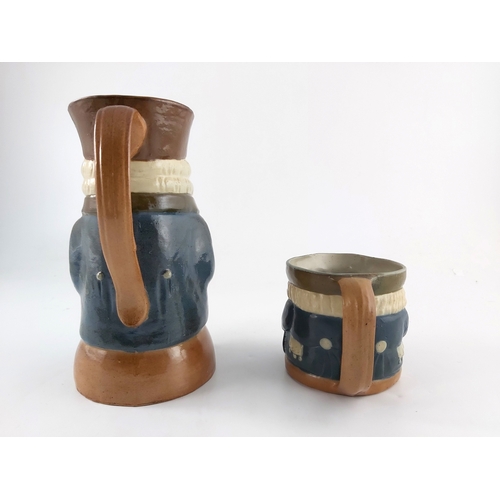 662 - Harry Simeon for Doulton Lambeth, two stoneware Toby jugs, one modelled with bottle and wine glass, ... 