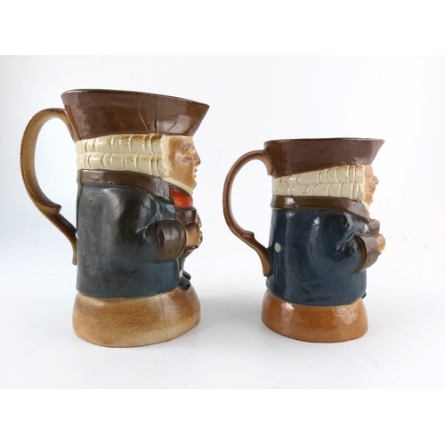 663 - Harry Simeon for Doulton Lambeth, two graduated stoneware Toby jugs, modelled with bottle and wine g... 