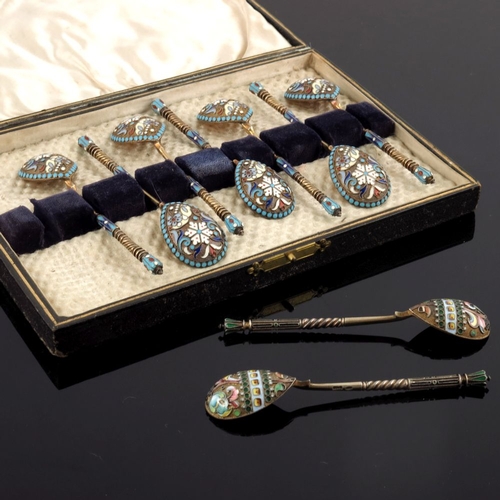 10 - A set of seven Russian silver gilt cloisonne enamel spoons, struck first Kokoshnik and workmaster ma... 