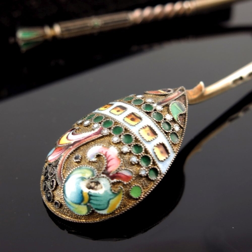 10 - A set of seven Russian silver gilt cloisonne enamel spoons, struck first Kokoshnik and workmaster ma... 