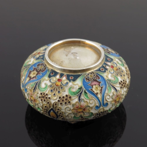 13 - A Russian silver cloisonne enamel snuff box, of circular form, the hinged cover with a floral design... 