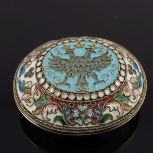 14 - A Russian silver cloisonne enamel snuff box, of oval form with a double headed coronet eagle design ... 