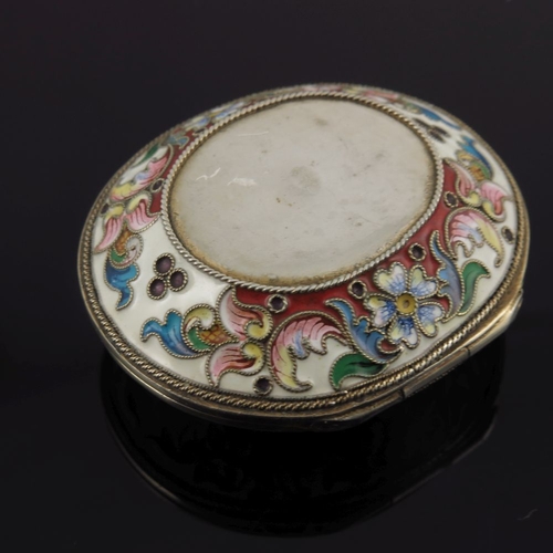 14 - A Russian silver cloisonne enamel snuff box, of oval form with a double headed coronet eagle design ... 