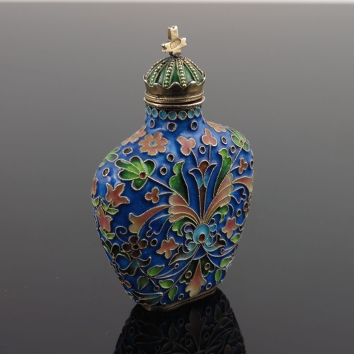 18 - A Russian silver cloisonne enamel scent flask, of shouldered form with floral design on a blue groun... 