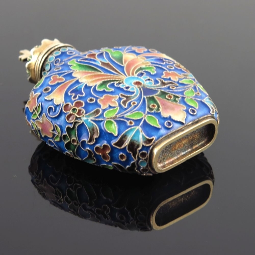 18 - A Russian silver cloisonne enamel scent flask, of shouldered form with floral design on a blue groun... 