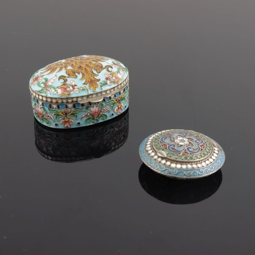 22 - A Russian silver cloisonne enamel pill box, of oval form with double headed eagle to the cover on a ... 