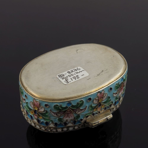 22 - A Russian silver cloisonne enamel pill box, of oval form with double headed eagle to the cover on a ... 