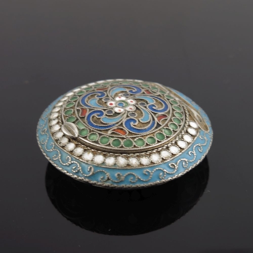 22 - A Russian silver cloisonne enamel pill box, of oval form with double headed eagle to the cover on a ... 