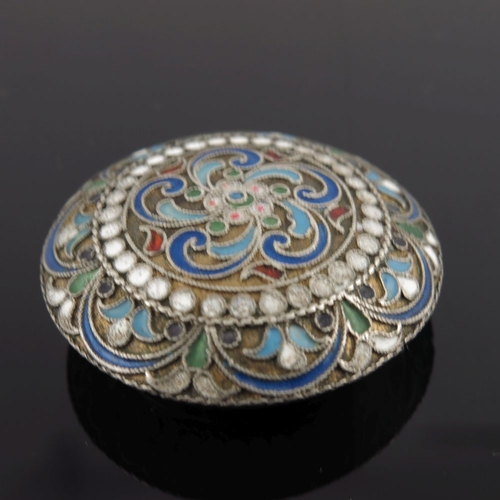 22 - A Russian silver cloisonne enamel pill box, of oval form with double headed eagle to the cover on a ... 