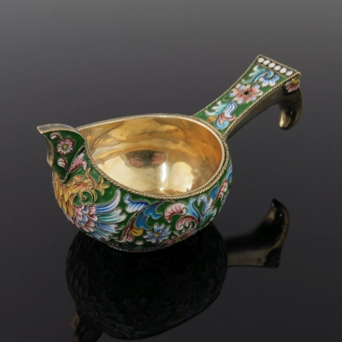 24 - A Russian silver gilt and cloisonne enamel kovsh, with floral pattern on a green ground, stamped St.... 