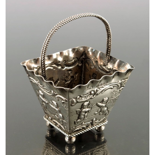 31 - A Dutch silver basket, import marks for London 1896, square section trapezoid form with crimped rims... 