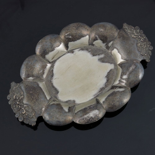 33 - An Austro Hungarian silver dish, STM, Vienna 1830s, lobed rim oval form with cast and chased foliate... 