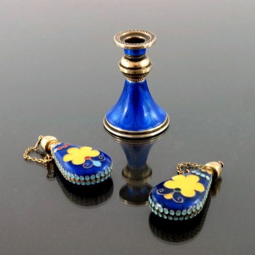 39 - A Continental silver gilt and blue enamel miniature candlestick, French import marks, splayed conica... 