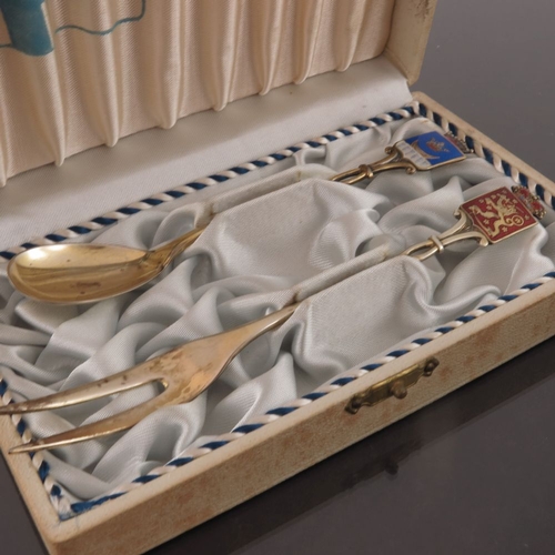 40 - A Harlequin set of six silver gilt and enamel coffee spoons, David Andersen, circa 1920s, together w... 