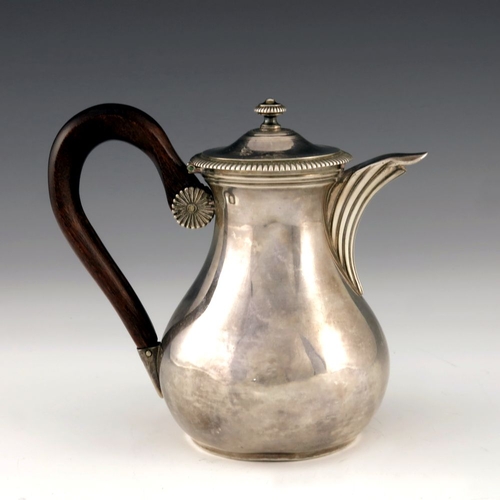 48 - A French silver teapot or water jug, EC, Paris circa 1830, baluster form with reeded spout, lid and ... 