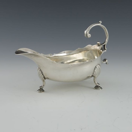 58 - A George III Scottish Provincial silver sauce boat, William Craw, Canongate circa 1760s, narrow helm... 