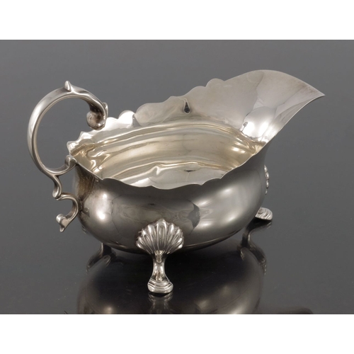 58 - A George III Scottish Provincial silver sauce boat, William Craw, Canongate circa 1760s, narrow helm... 