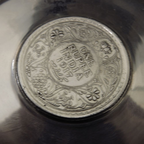 6 - A pair of Anglo Indian silver coin set dishes, dated 1878 and 1917, each with a one Rupee coin, Vict... 