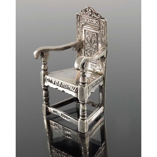 68 - A Victorian silver miniature chair, John Smith, London 1898, modelled as Shakespeare's armchair, Ger... 