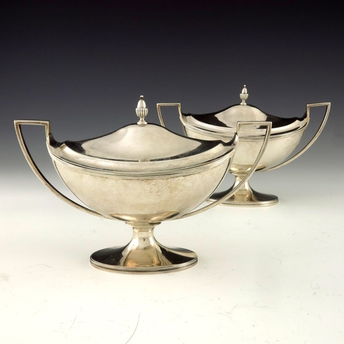 69 - A pair of George III silver sauce tureens and covers, Henry Chawner and John Emes, London 1797, twin... 