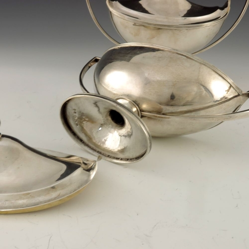 69 - A pair of George III silver sauce tureens and covers, Henry Chawner and John Emes, London 1797, twin... 