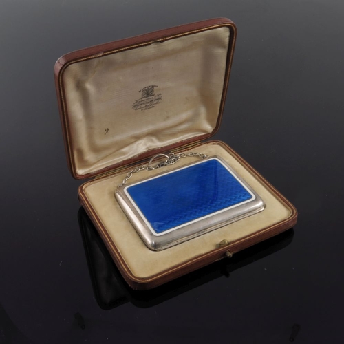 72 - A George V silver and enamel lady's evening purse, Royal blue guilloche enamel panel to the cover, o... 