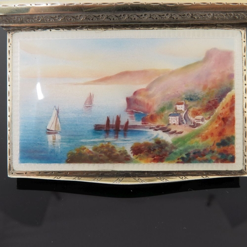 74 - A mid Victorian silver gilt snuff box, the cover painted with a Continental harbour scene with saili... 