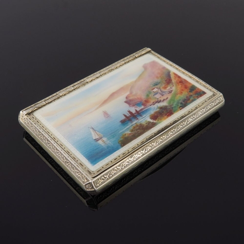 74 - A mid Victorian silver gilt snuff box, the cover painted with a Continental harbour scene with saili... 