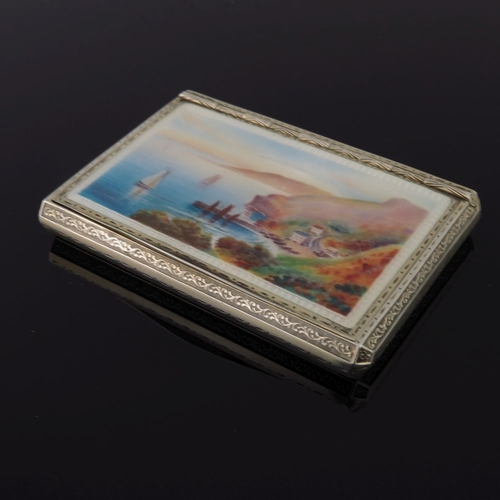 74 - A mid Victorian silver gilt snuff box, the cover painted with a Continental harbour scene with saili... 