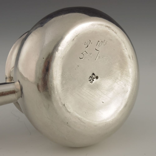 79 - A Queen Anne silver brandy pan, Pierre Platel, London circa 1705, squat baluster form with pinched l... 