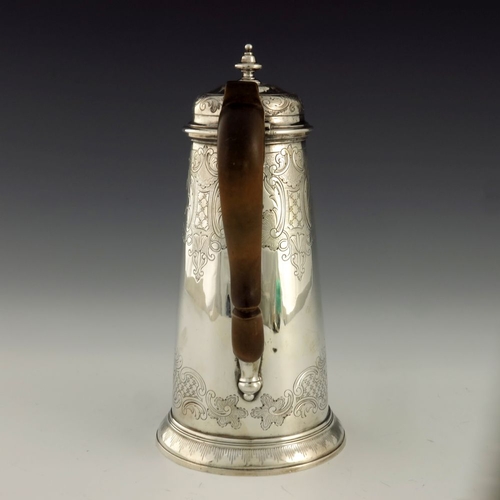 93 - A George II silver coffee pot, Richard Burcombe, London 1734, conical form with fluted petal spout a... 